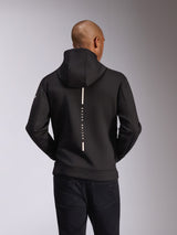 Alpinestars Insight Hoodie, vista trasera, negro, franja blanca vertical con el texto 'RACING AHEAD', marca de palabra en la manga, ropa urbana casual inspirada en el automovilismo