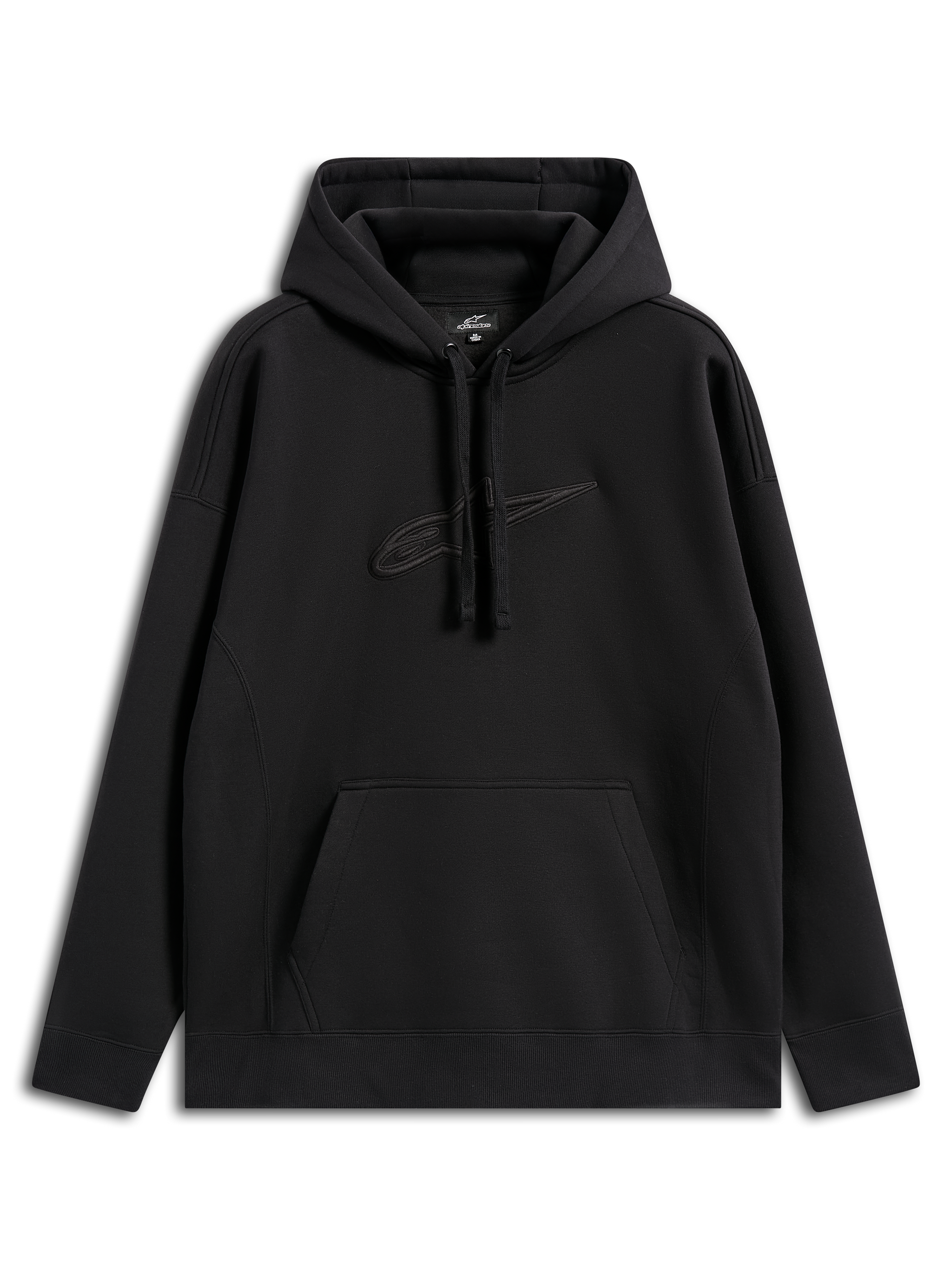 Sudadera Alpinestars Emergent Oversized, estilo streetwear casual, color negro con logo Astars bordado a tono, ajuste holgado, capucha con cordón, bolsillo tipo canguro, diseño moderno inspirado en el automovilismo