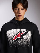 Alpinestars Obsessed Hoodie, black pullover fleece, featuring a red and white Astars logo inside a white stippled MX gradation graphic on the chest, worn by a model, casual motorsport streetwear with adjustable drawstring hood