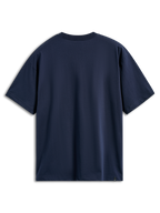 Alpinestars Aplomb Oversized CSF Tee, camiseta de manga corta, azul marino, vista posterior, ajuste holgado extragrande, diseño liso con una pequeña etiqueta de logotipo en el dobladillo inferior, ropa deportiva casual