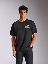 Alpinestars Wild Oversized CSF Tee, camiseta de manga corta, negra, logotipo Astars blanco con texto multicolor vibrante, ropa urbana casual de automovilismo
