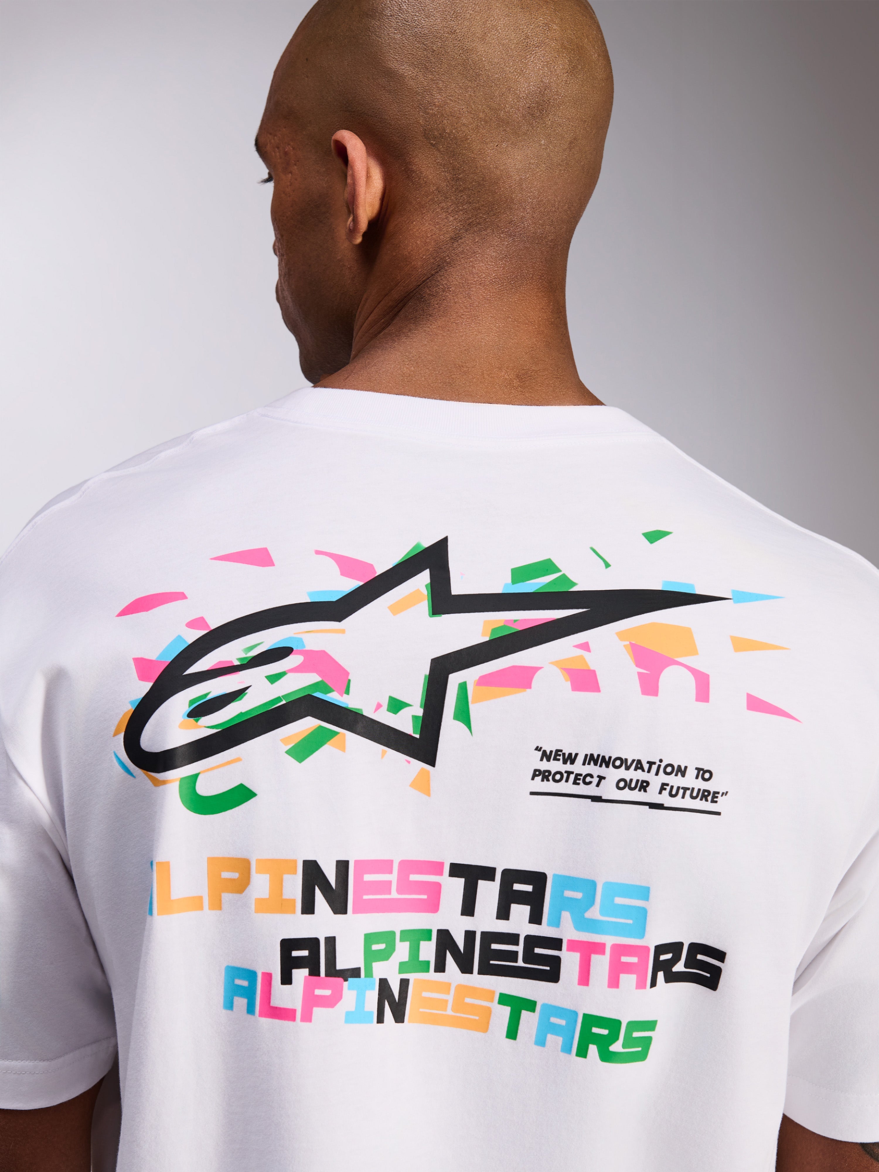 Alpinestars Wild Oversized CSF Tee, Short Sleeve T-Shirt, White, Back Graphic with Vibrant Multi-Color Astars Logo and Slogan Text, Casual Sportswear