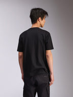Alpinestars Noka CSF Tee, camiseta de manga corta, negra, vista posterior, ropa urbana casual inspirada en el automovilismo