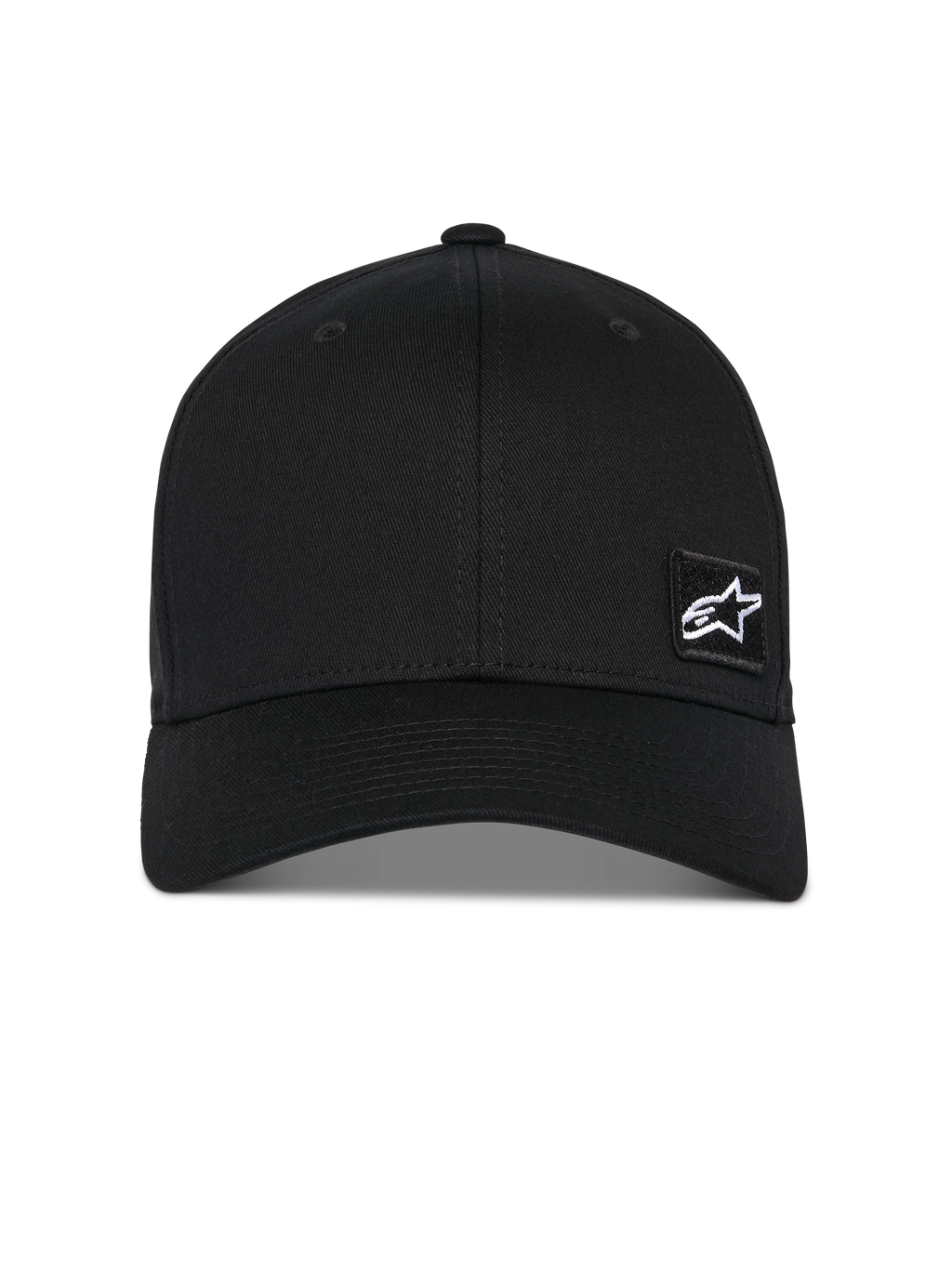 Gorra Pivot de Alpinestars, gorra de béisbol negra, visera curva con corona estructurada, pequeño logo de estrella Astars blanco en un parche bordado negro, ropa deportiva casual inspirada en el motociclismo