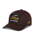 Alpinestars Matrix Snapback Hat, Brown, featuring a front embroidered patch with white logo, yellow branding, and checkered pattern, side Astars logo, curved bill, casual sportswear