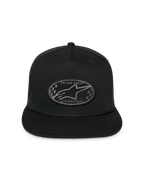 Gorra Alpinestars Contender Trucker, negra, gorra snapback estructurada con visera plana, parche bordado ovalado con logo Astars y diseño de cuadros en la parte delantera, panel de malla trasera, accesorio de ropa deportiva casual