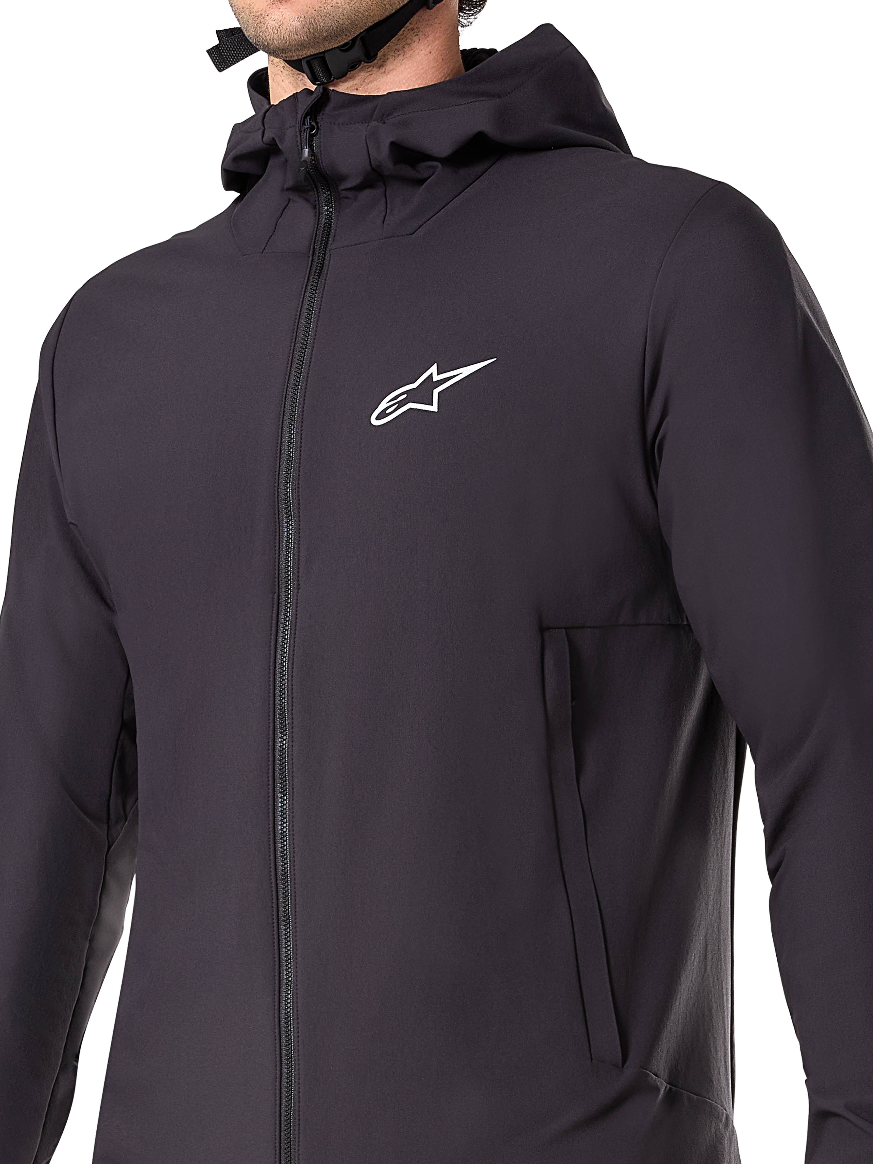 Alpinestars Chaqueta Térmica A-Dura, chaqueta de MTB negra, primer plano del tejido técnico aislante, diseño ligero y transpirable para ciclismo de montaña en climas fríos