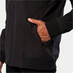 Alpinestars Primary Jacket, Black Softshell Jacket, close-up detail of hand pocket, ribbed cuff, and ribbed hem, casual motorsport-inspired technical outerwear
