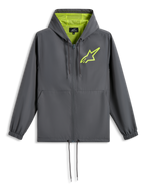 Chaqueta Cortavientos Speeder Chromium de Alpinestars, gris carbón con amarillo de alta visibilidad, logotipo de estrella verde lima en el pecho, capucha con forro de malla, frontal de cremallera completa con cordón en el dobladillo, cortavientos casual inspirado en el automovilismo