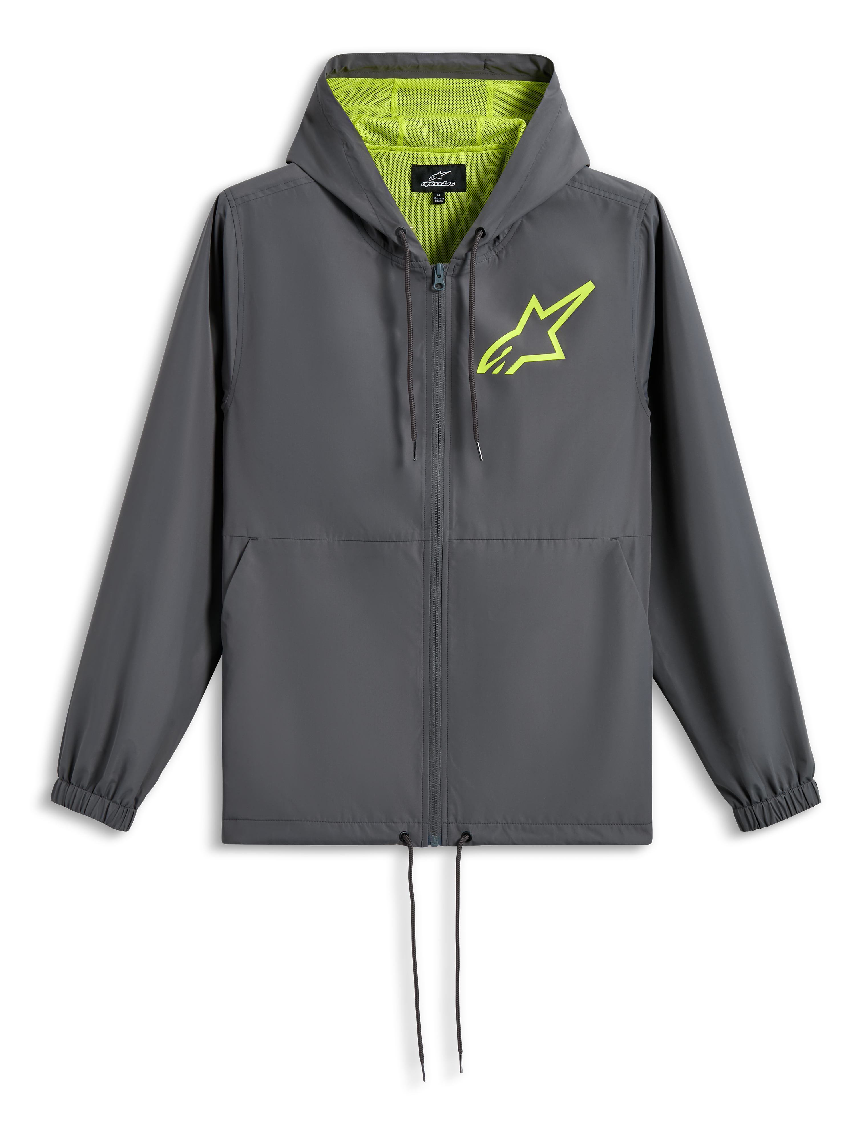 Chaqueta Cortavientos Speeder Chromium de Alpinestars, gris carbón con amarillo de alta visibilidad, logotipo de estrella verde lima en el pecho, capucha con forro de malla, frontal de cremallera completa con cordón en el dobladillo, cortavientos casual inspirado en el automovilismo