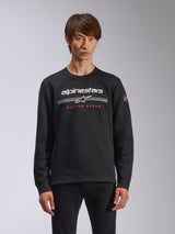 Alpinestars Bettern Crew, sudadera de cuello redondo en color negro, con el logotipo de Alpinestars en blanco, franjas horizontales grises y el texto 'RACING AHEAD' en rojo, ropa urbana casual de estilo motorsport