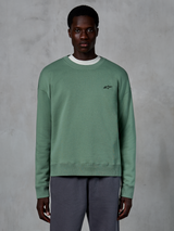 Alpinestars Essentials Ageless Crew, sudadera casual de cuello redondo, verde Cactus con un pequeño logo de estrella negro en el pecho, cuello, puños y dobladillo acanalados, ropa deportiva de forro polar compacto premium