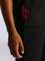 Camiseta Alpinestars Shaded CSF, camiseta de manga corta, negra, primer plano del gráfico de texto rojo en la parte posterior con 'Alpinestars One Goal. One Vision.' y el logo Astar, estilo streetwear casual de automovilismo