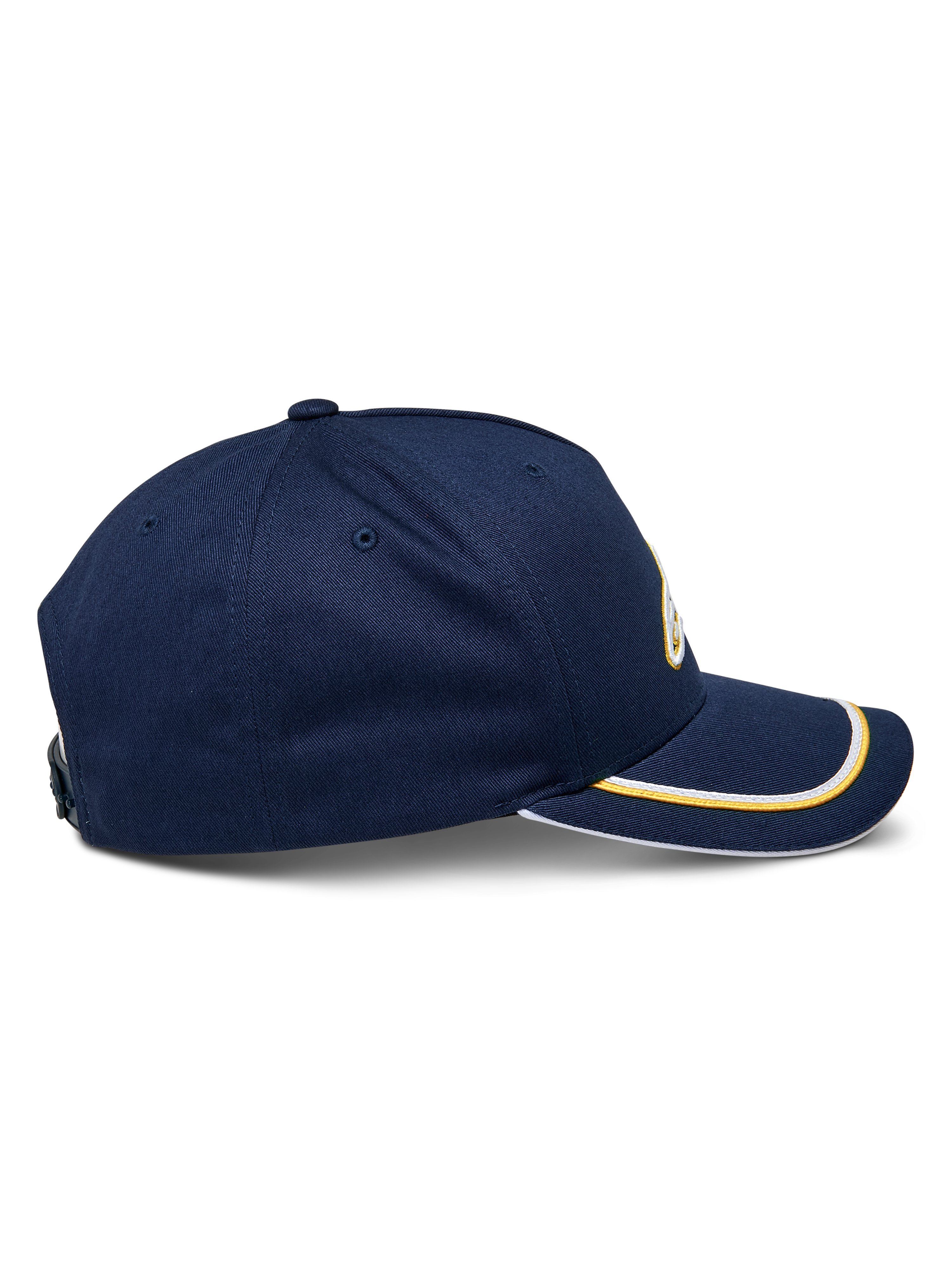 Gorra Alpinestars Ascension Snapback, vista lateral, azul marino con doble ribete sutache en dorado y blanco en la visera curva, corona estructurada, gorra casual de estilo motorsport