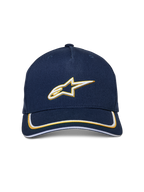 Alpinestars Ascension Snapback Hat, azul marino y dorado, logotipo Astars bordado en 3D en blanco y dorado, visera curva con doble ribete sutache, accesorio casual inspirado en el automovilismo