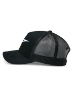 Alpinestars Ageless Trucker Hat, Black, side profile view, structured cotton twill front with white embroidered Astars logo, breathable black mesh back, curved bill, casual motorsport headwear