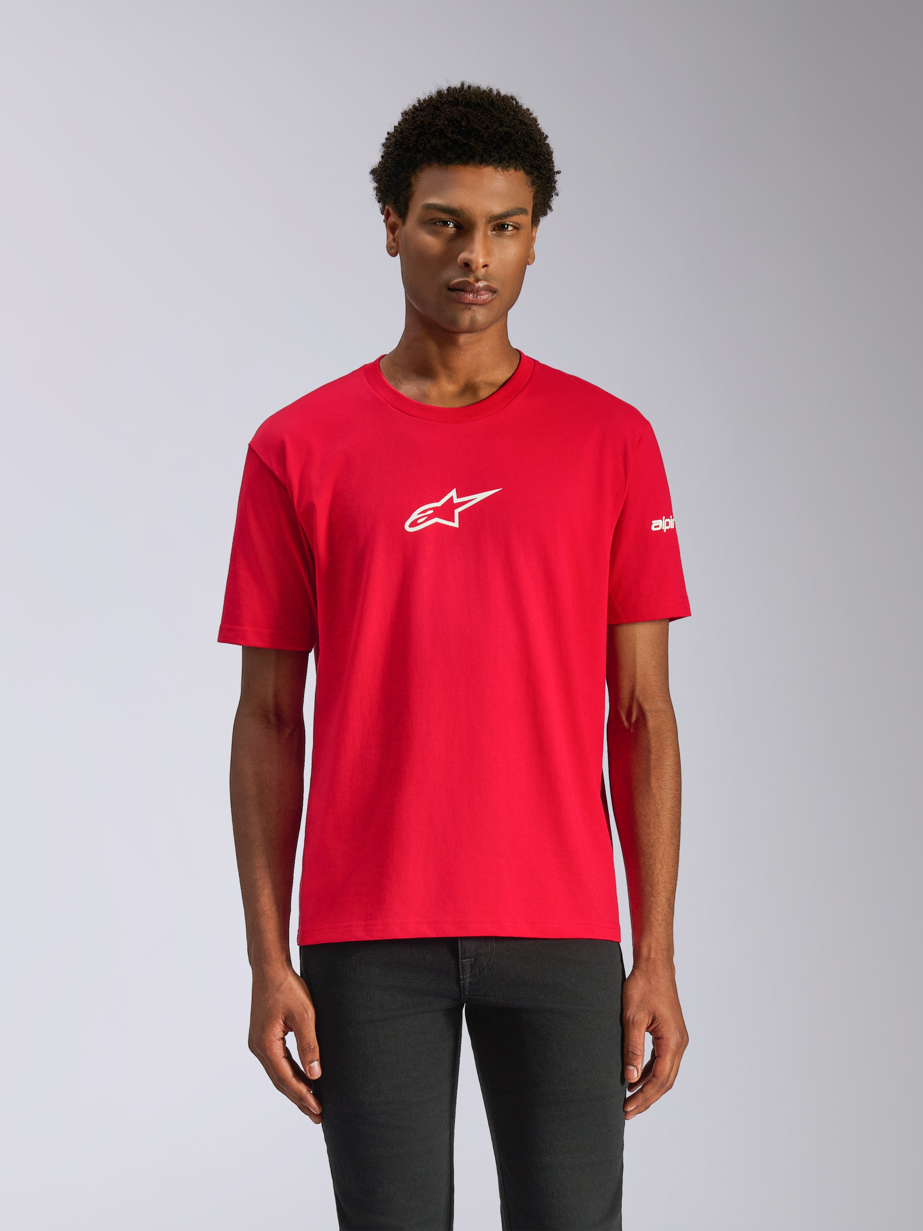 Alpinestars Frontal CSF Tee, Short Sleeve T-Shirt, Red, white star logo on center chest, worn by a model with dark pants, casual performance motorsport-inspired design