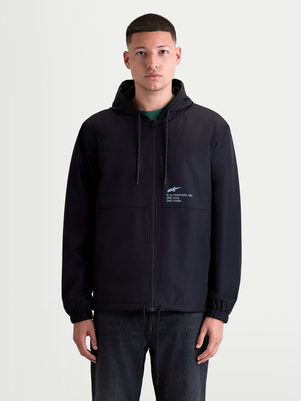 Alpinestars Speeder Resolve, chaqueta cortavientos para hombre, negra, ligera con capucha ajustable y forro de malla, marca 'One Goal. One Vision.' en el pecho, estilo sportswear