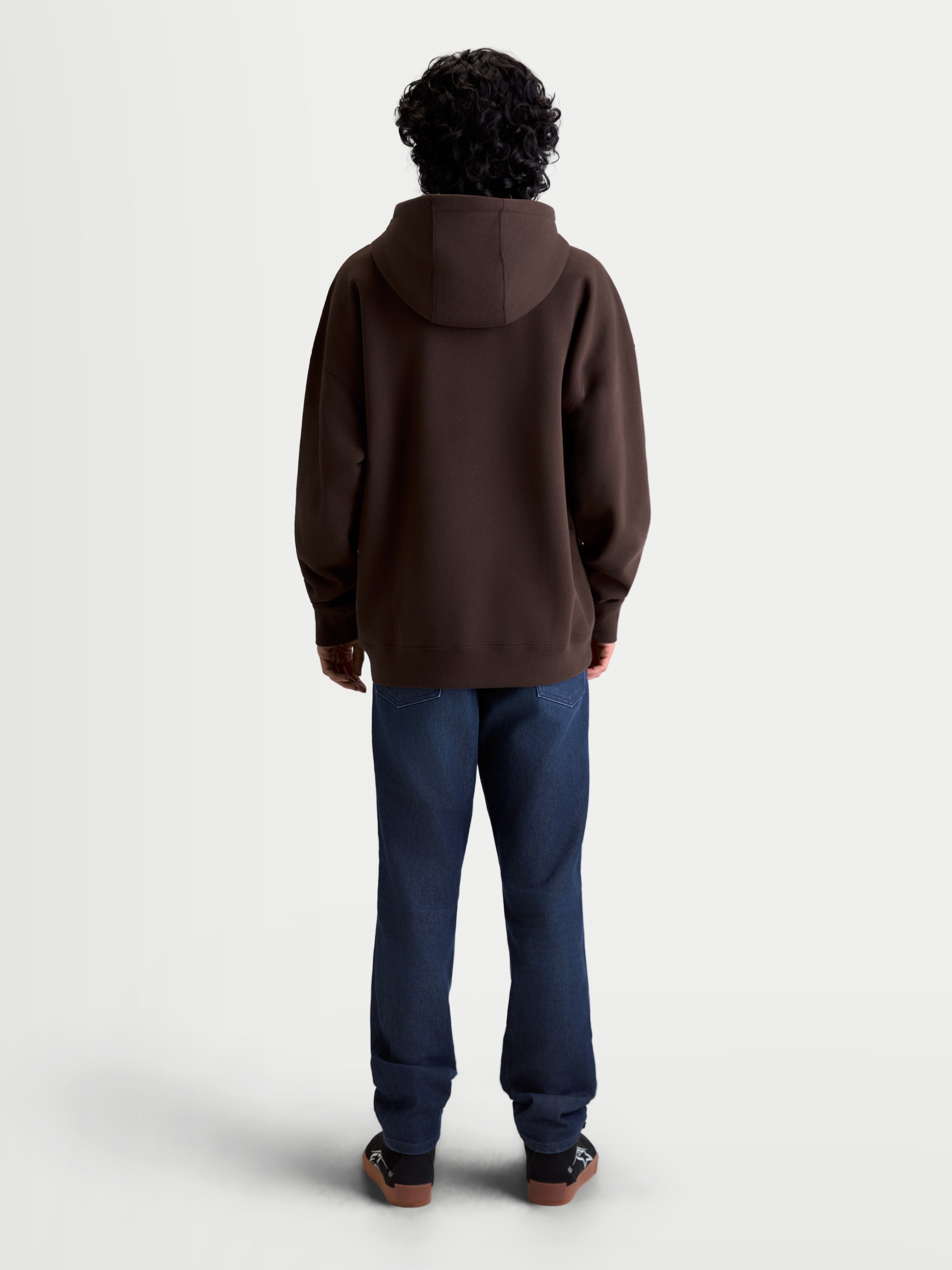 Alpinestars Prelude Oversized Hoodie, Brown Sportswear Fleece Pullover, Rear View on Model, featuring a relaxed silhouette, oversized fit, hood, and ribbed hem for casual comfort.