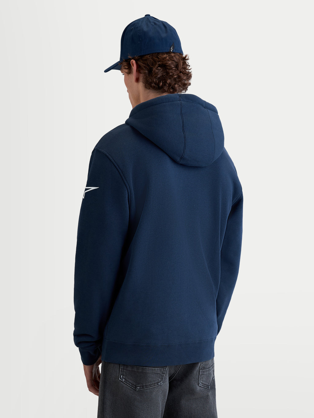 Alpinestars Race Wordmark, sudadera con capucha de forro polar para hombre, azul marino y blanco, vista posterior con logotipo Ageless blanco en la manga y capucha forrada