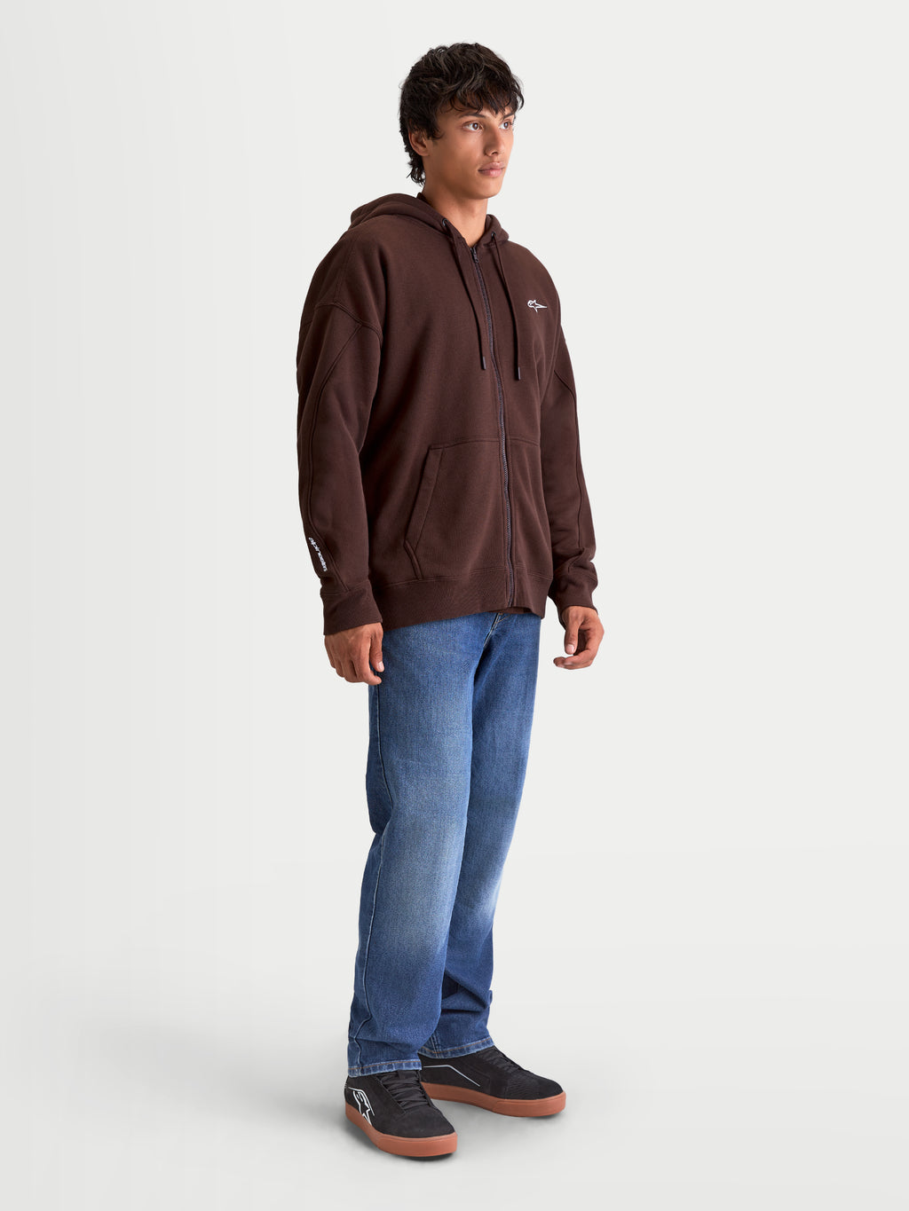 Alpinestars Entity Oversized Hoodie, Brown Zip-Up Fleece Sportswear for Men, featuring a Vislon front zipper, kangaroo pocket, and embroidered logo details on the chest and sleeve, oversized relaxed fit for everyday motorsport style.