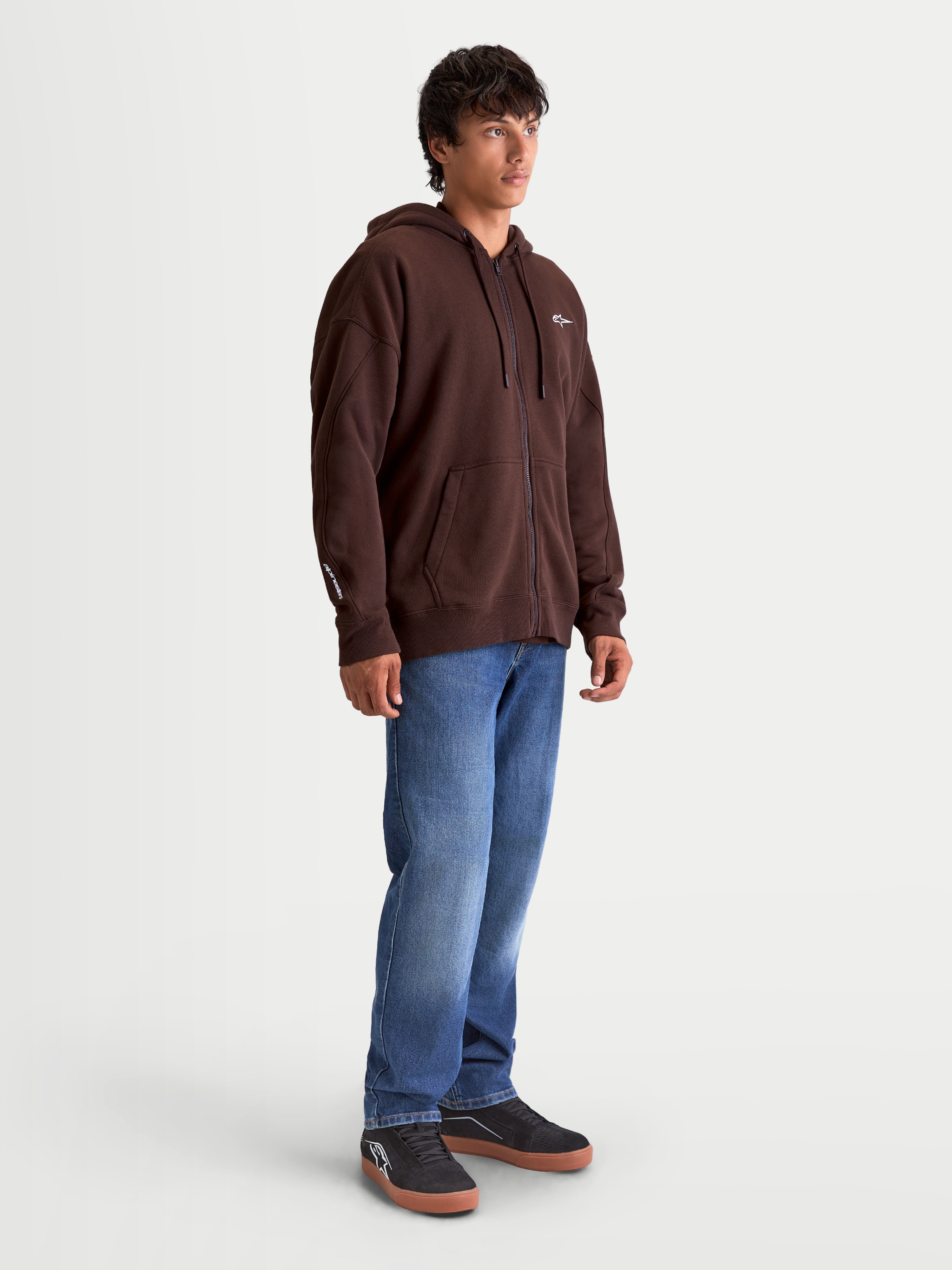 Alpinestars Entity Oversized Hoodie, Brown Zip-Up Fleece Sportswear for Men, featuring a Vislon front zipper, kangaroo pocket, and embroidered logo details on the chest and sleeve, oversized relaxed fit for everyday motorsport style.