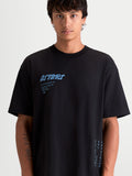 Alpinestars Chalk Oversized CSF Tee, Men's Sportswear T-Shirt, Black with Light Blue Graphics, features a relaxed oversized fit, soft-hand front Astars word logo, and side text branding, comfortable cotton/polyester blend for everyday casual wear.