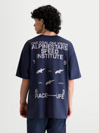 Alpinestars Institute Oversized CSF Tee, Men's Sportswear Short Sleeve T-Shirt in Navy Blue, featuring a large white back graphic with Speed Institute and 1963 Race-Life text, oversized relaxed fit for everyday comfort.