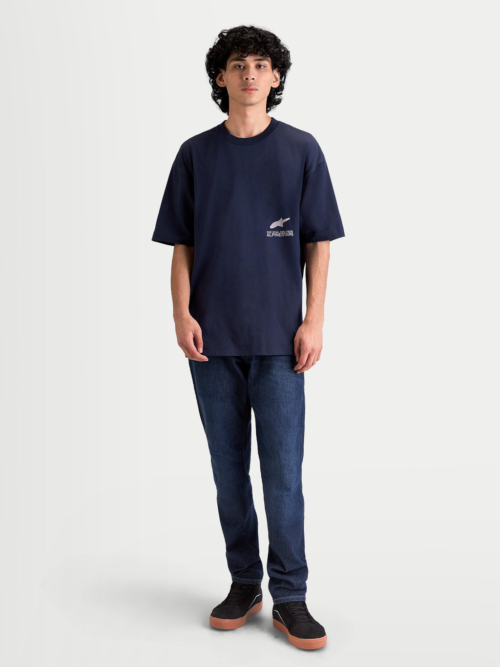 Alpinestars Institute Oversized CSF Tee, Men's Sportswear Short Sleeve T-Shirt, Navy Blue, features a small white front chest logo and relaxed oversized fit, constructed from a soft combed ring-spun cotton and polyester blend for everyday comfort.