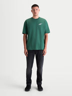 Alpinestars Checkback Oversized CSF, camiseta de mangas cortas para hombre, verde con pequeño logotipo Astars en el pecho, ajuste relajado oversized, ropa deportiva de estilo motorsport