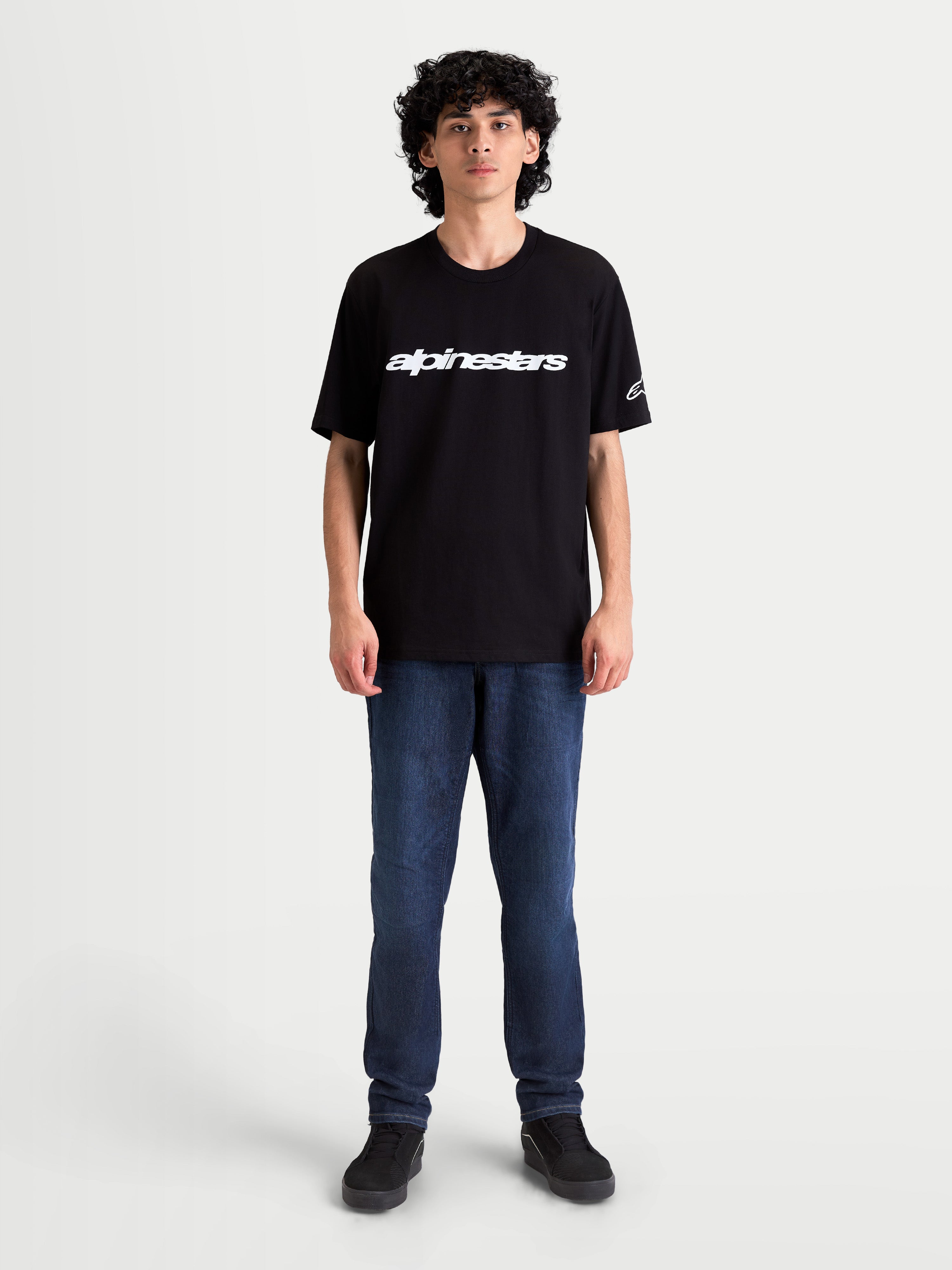 Alpinestars Race Wordmark CSF Tee, Men's Short Sleeve Sportswear T-Shirt in Black and White, featuring a bold Alpinestars wordmark on the chest and an Ageless logo on the sleeve, casual motorsport-inspired apparel.