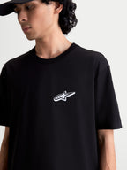 Alpinestars Meteor CSF, camiseta de mangas cortas para hombre, negra con logotipo Astars blanco en el pecho, confeccionada en mezcla de algodón y poliéster, ropa deportiva de estilo casual vista en modelo