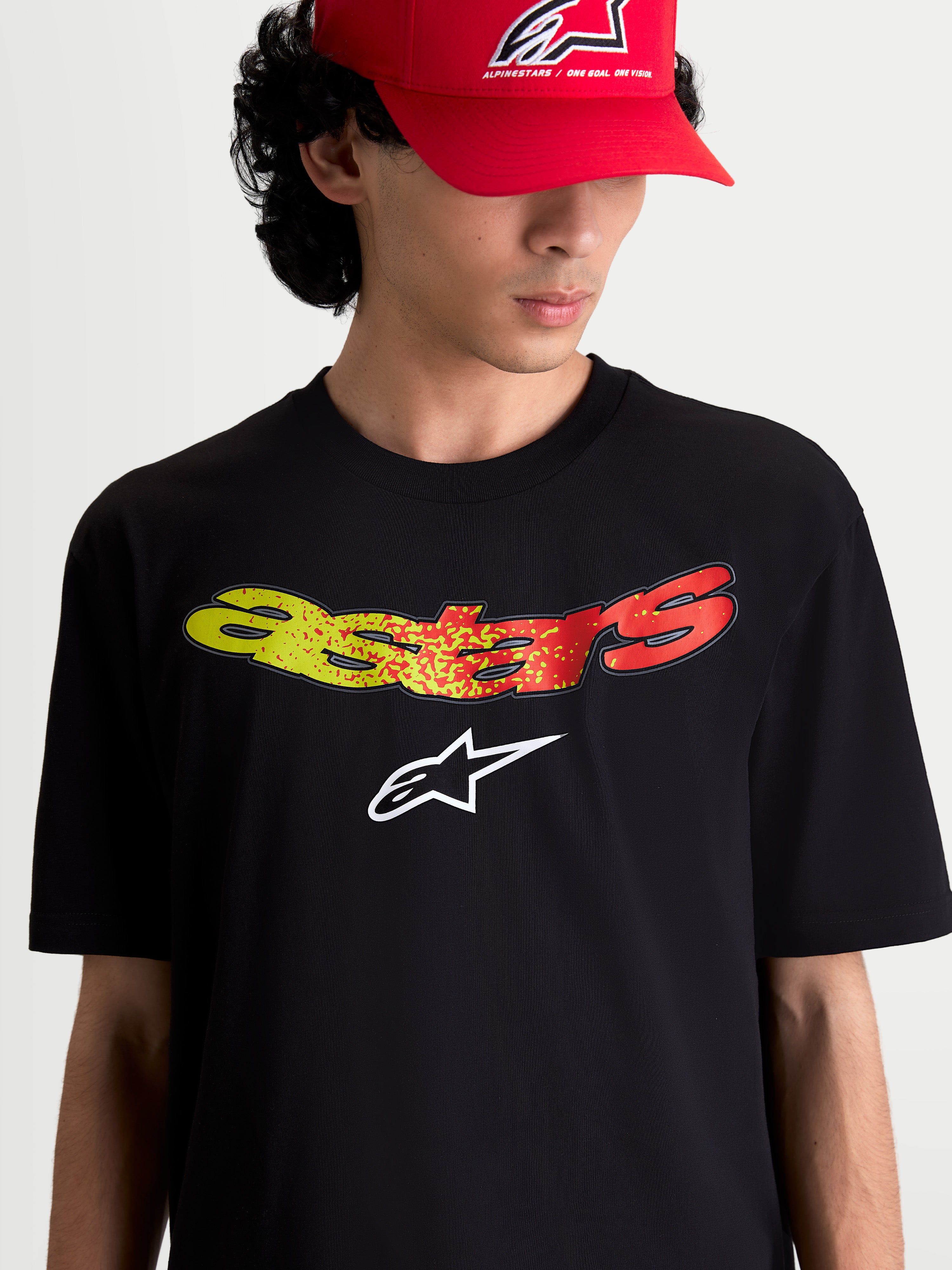 Alpinestars Elliptogrit CSF, camiseta de mangas cortas para hombre, negra con gráfico de pecho Astars en degradado amarillo y rojo, estilo casual y deportivo