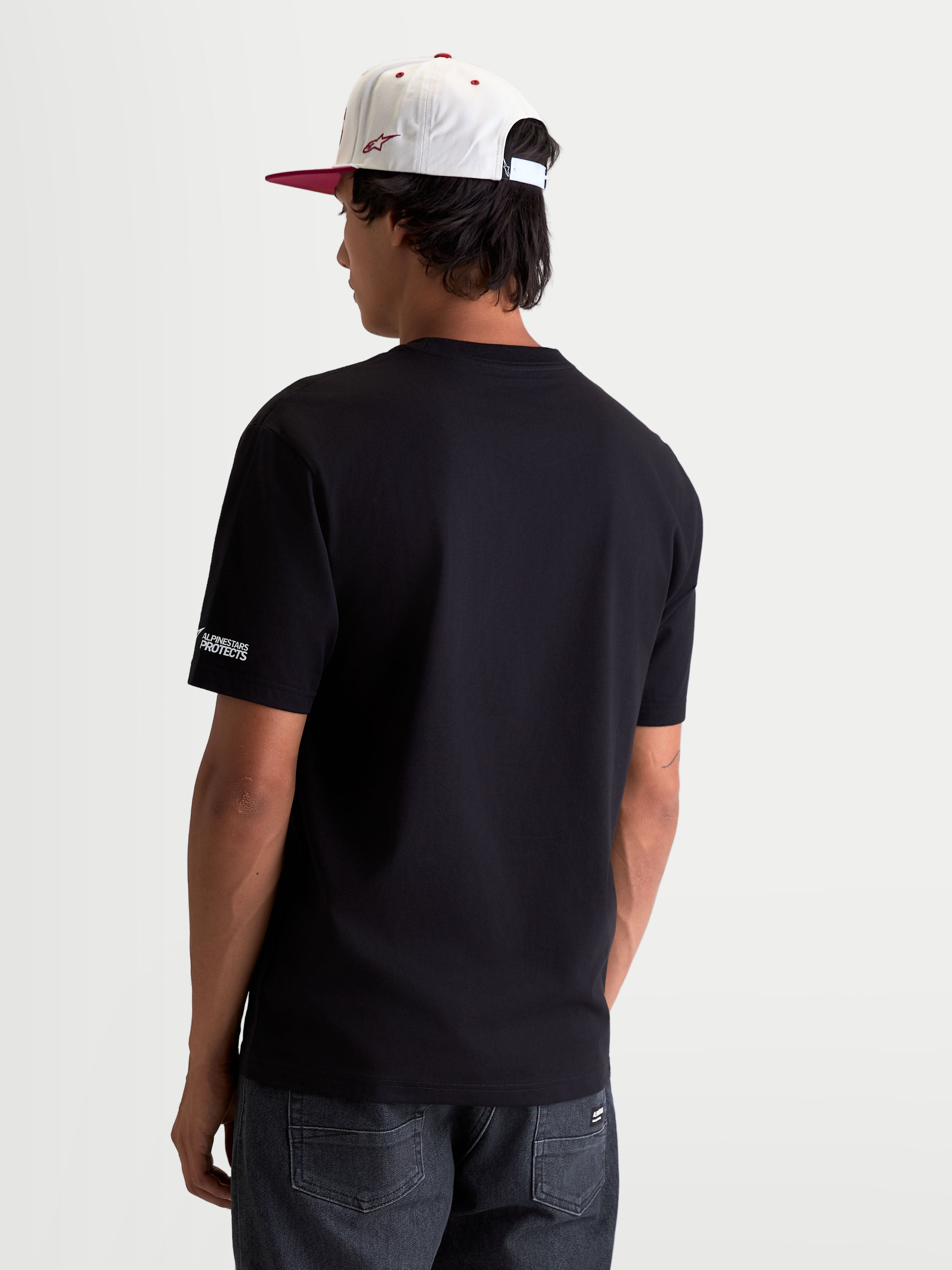 Alpinestars P1 CSF Tee, Short Sleeve Sportswear T-Shirt, Unisex, Black, featuring a front race stripe logo graphic with a soft-hand print, constructed from a comfortable cotton-poly blend for everyday motorsport style.