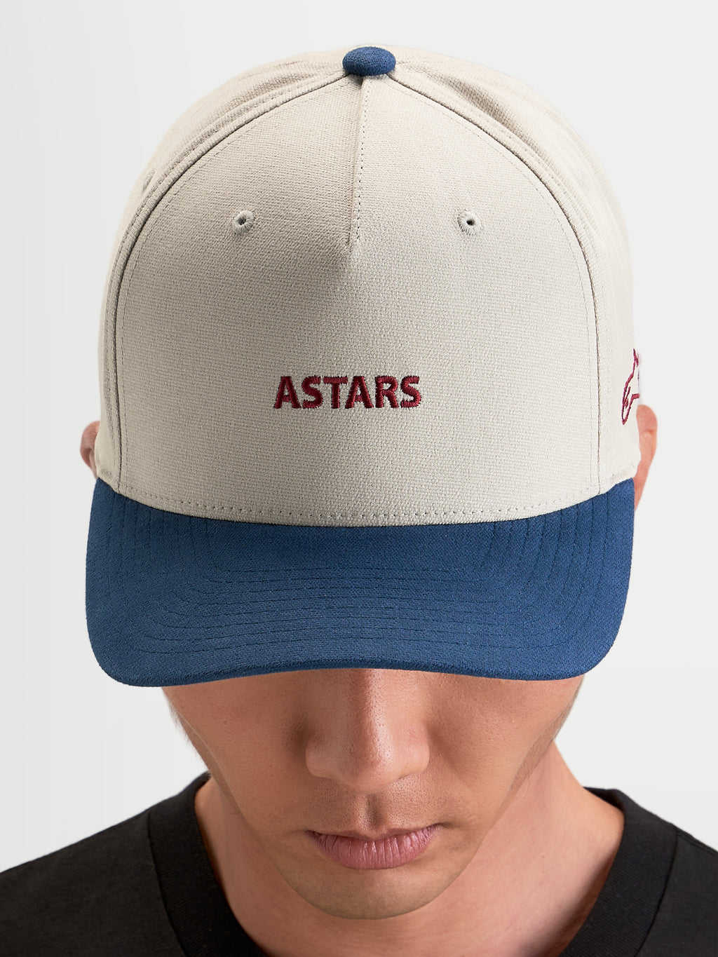 Alpinestars Gorra County Canvas, gorra sportswear en color arena y azul, visera curva, corona estructurada, con bordado frontal Astars en modelo