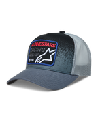 Alpinestars Gravel, gorra trucker gris y negra con malla trasera, visera curva y parche frontal de carreras