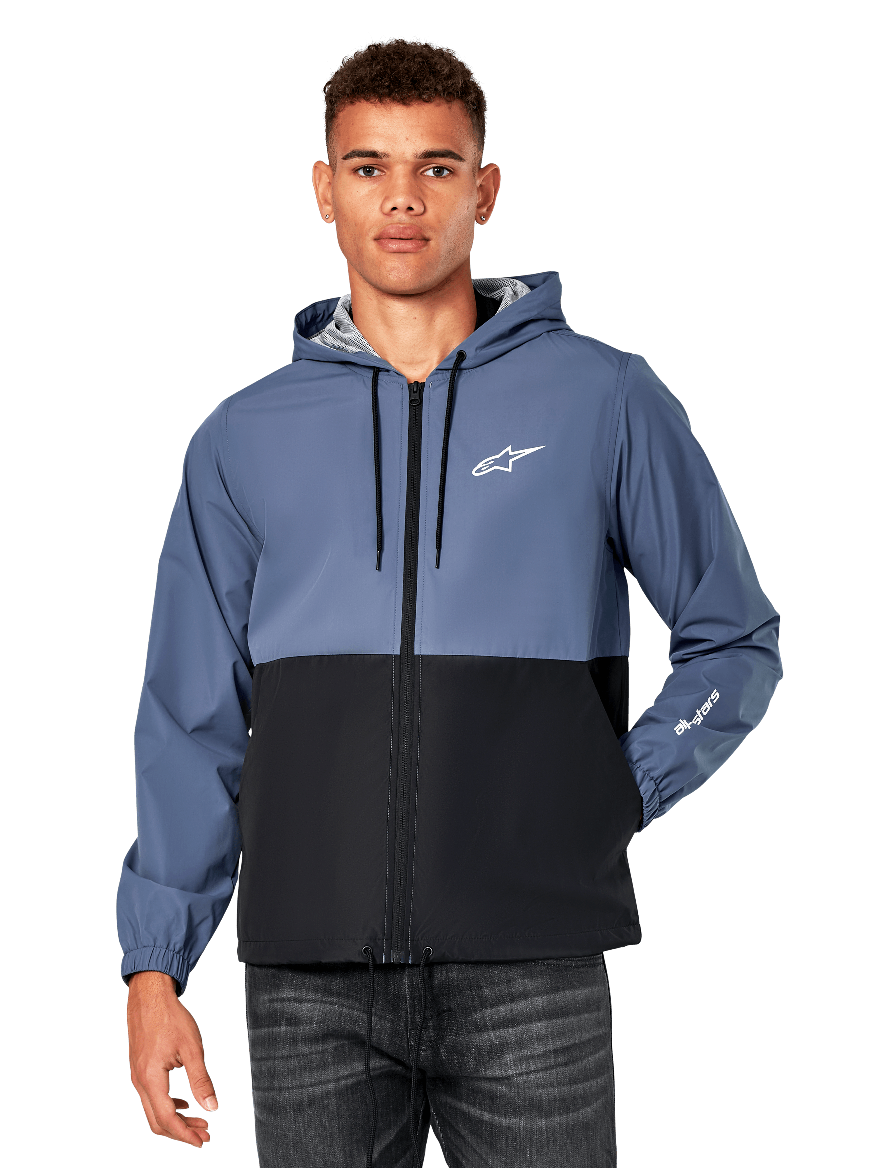 Chaqueta cortavientos Alpinestars Speeder, cortavientos informal con capucha, diseño con bloques de color en azul pizarra y negro, logotipo Astar blanco en el pecho y marca en la manga, cremallera frontal con capucha ajustable con cordón, forro de malla ligero