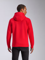 Alpinestars Ageless V3 Hoodie, back view, red pullover hoodie, casual sportswear featuring a jersey-lined hood and ribbed cuffs, worn by a model with black pants