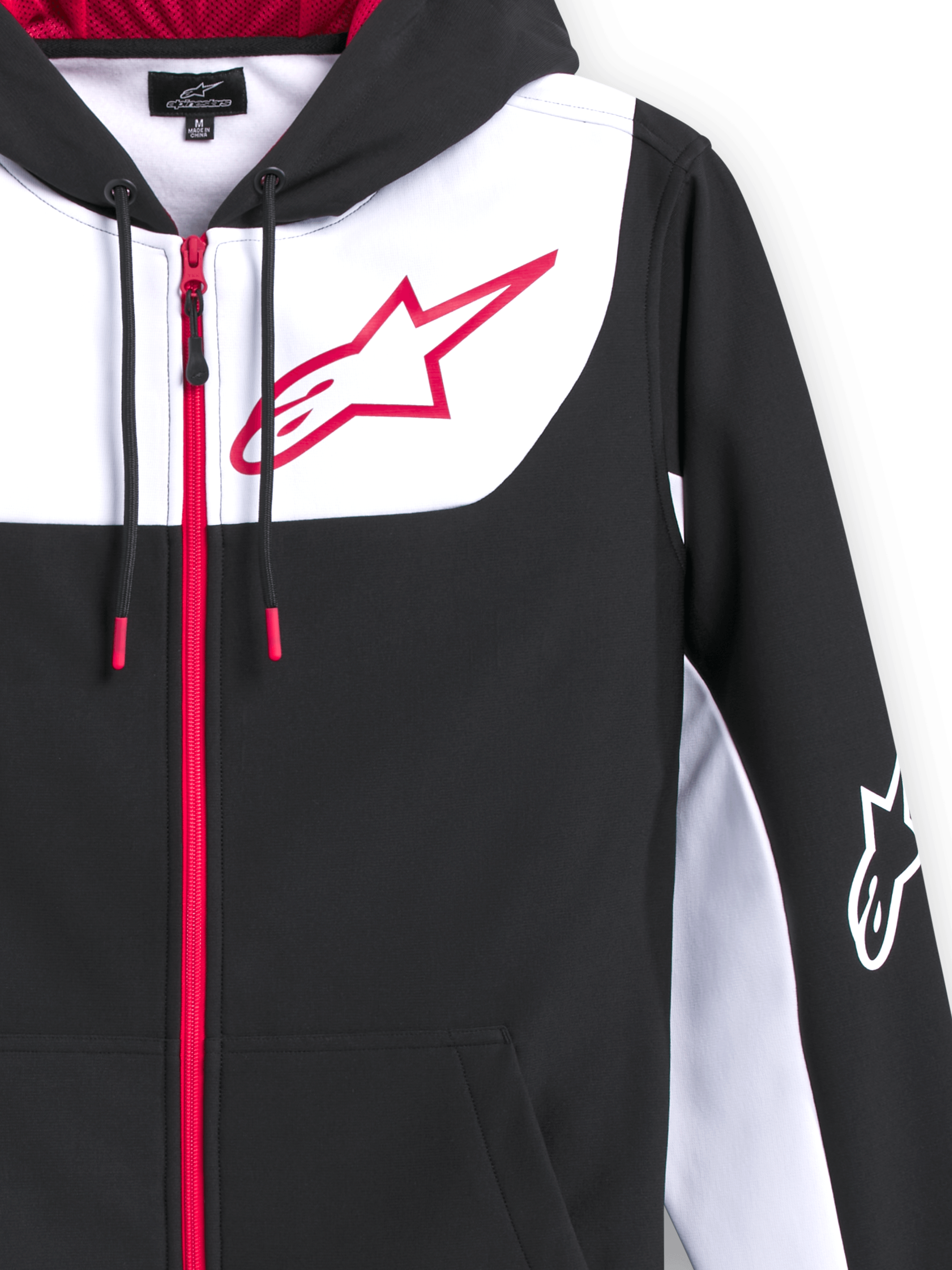 Sudadera con capucha Alpinestars Sessions V3, sudadera de forro polar de poliéster con cremallera frontal, negra con detalles en blanco y rojo, con un gran logotipo de estrella Alpinestars en rojo en el pecho, cremallera roja, cordones con puntas rojas y logotipo blanco en la manga, diseño casual inspirado en el automovilismo