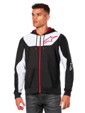 Alpinestars Sessions V3 Hoodie, sudadera con cremallera frontal, negra con paneles blancos y detalles rojos, con cremallera roja, capucha forrada de malla y logotipo de estrella de Alpinestars en el pecho, ropa urbana casual inspirada en el automovilismo