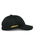 Alpinestars Sessionized Hat, side view of black snapback cap, gold flat astars embroidery on the side, structured crown with curved bill, casual motorsport-inspired headwear