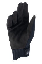 Guantes de lluvia Alpinestars A-Dura, guantes de ciclismo negros, vista de la palma que muestra material de gamuza sintética, puño de neopreno acanalado con cierre de gancho y bucle, diseño de perfil bajo para ciclismo de montaña y protección para climas húmedos