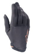 Guantes Alpinestars A-Aria, guantes para ciclismo de montaña (MTB), negros con logo de estrella en oro rosa, con un patrón de cuadrícula texturizado en los dedos y tejido elástico ligero para rodar por senderos
