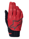Guantes Alpinestars A-Dura, guantes de ciclismo MTB, naranja oscuro y negro, parte superior con patrón de cuadrícula texturizada, logotipo de estrella negra grande, puño de neopreno negro con marca en rojo, diseñados para el agarre y el rendimiento en bicicleta de montaña