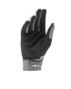 Guantes Alpinestars A-Dura Gel, guantes de mountain bike en gris claro y negro, vista de la palma que muestra ante sintético negro con acolchado de inserción de gel, puño de neopreno con cierre de muñeca de gancho y bucle con el logotipo de la marca, equipamiento ergonómico para ciclismo