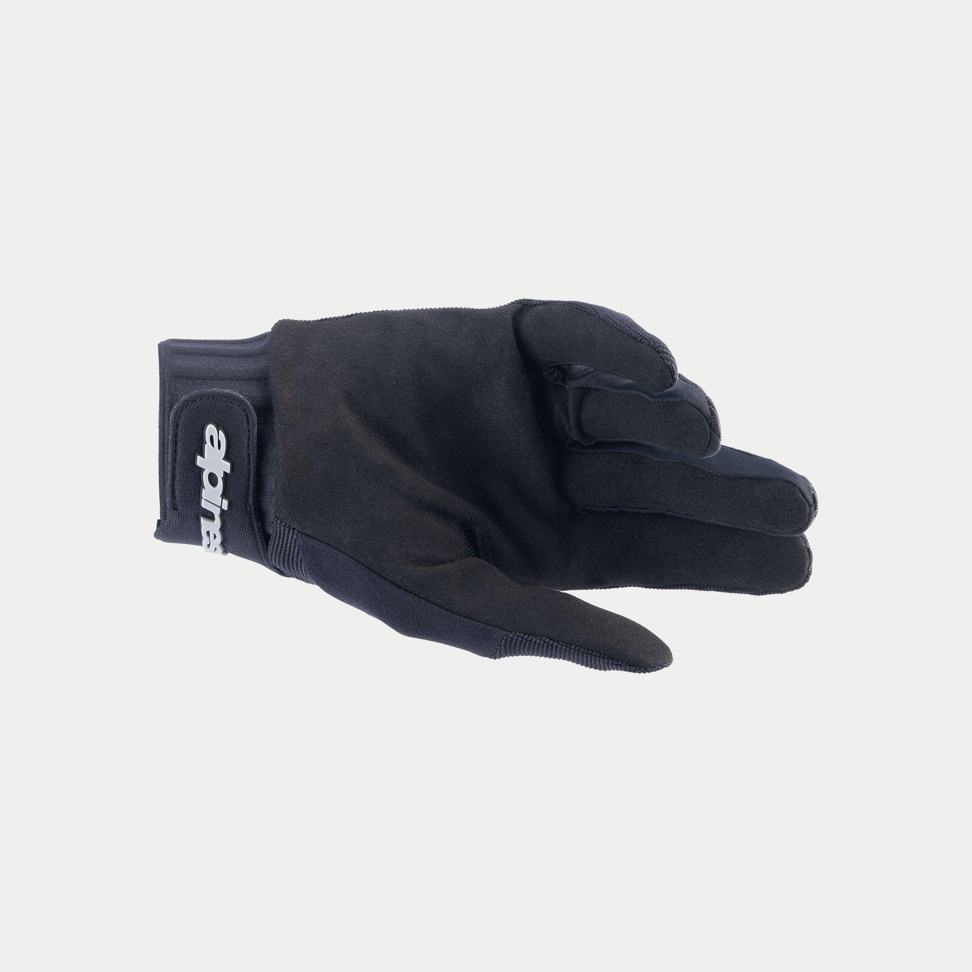 Guantes Alpinestars Stella A-Dura, guantes de ciclismo para mujer, negros, con palma de ante sintético duradera, puño de neopreno con cierre de muñeca de gancho y bucle, y logotipo de Alpinestars en blanco.