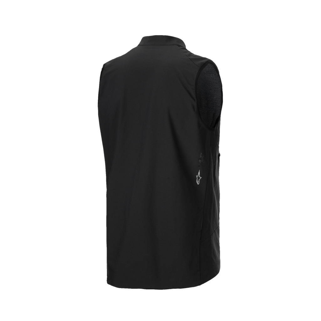 Alpinestars A-Dura Thermal Vest, chaleco de ciclismo negro, vista trasera en tres cuartos que muestra el tejido suave y un pequeño logotipo blanco de Alpinestars en el lateral inferior, aislamiento térmico ligero para ciclismo de montaña