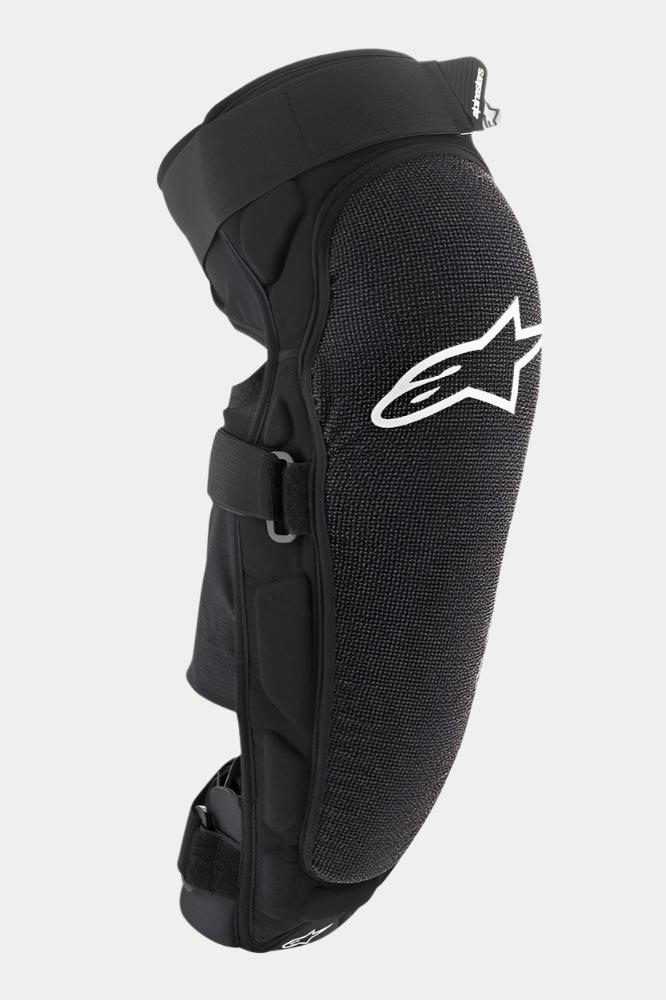 Protector de rodilla/espinilla Alpinestars Vector Pro, negro, con un logotipo de Alpinestars blanco en la rodilla, panel frontal texturizado resistente a la abrasión, correas ajustables de gancho y bucle, equipo de protección transpirable para MTB