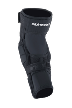 Protector de rodilla Alpinestars A-Impact Plasma Elite, protector de rodilla para ciclismo, negro y blanco, con un sistema de cierre de doble correa con el logotipo de Alpinestars en blanco, paneles de malla y un diseño ergonómico precurvado para protección contra impactos en MTB
