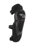 Protectores de rodilla y espinilla Alpinestars Bionic Plus, negros, protección para todoterreno y MTB, con carcasa perforada de panal, logo de Alpinestars blanco, correas dobles ajustables y ventilación de malla 3D, diseño ergonómico curvo